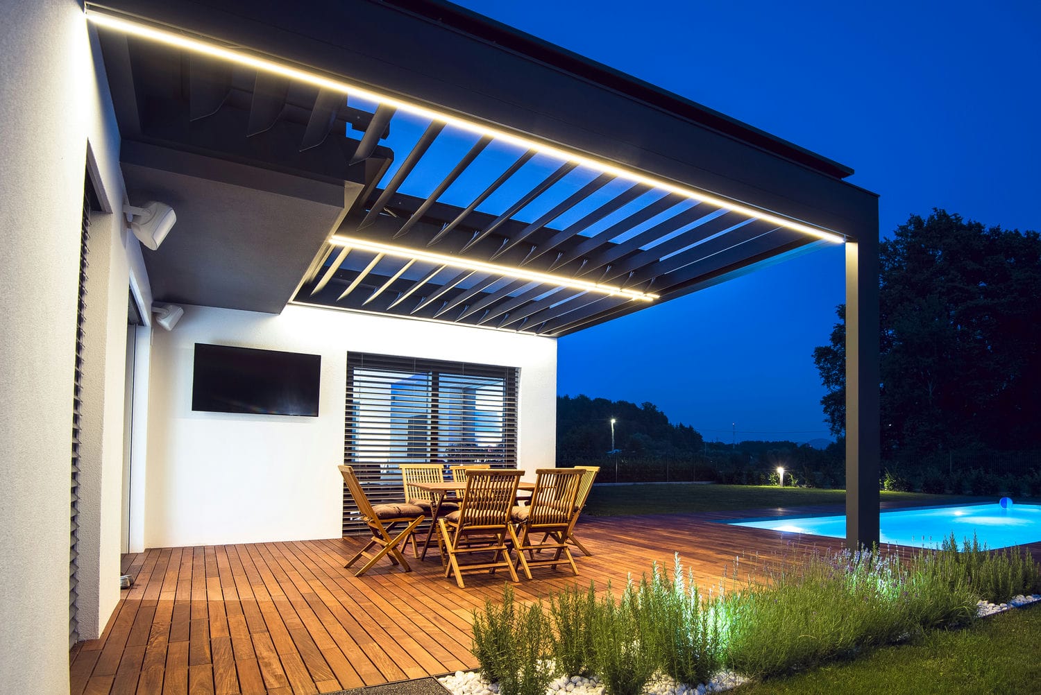 covered backyard pergola and deck constructed with exterior carpentry