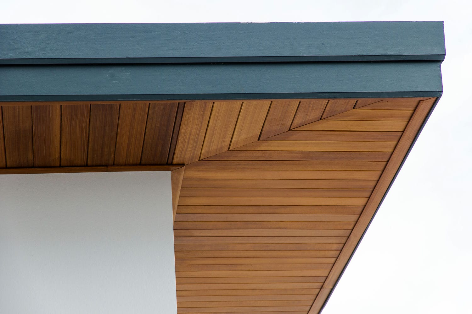 soffit and exterior finishing carpentry detail on modern home roofline