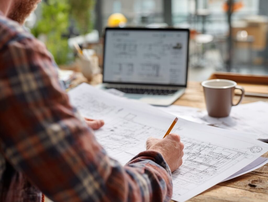 Builder reviewing site-specific seismic information for a custom home project in BC