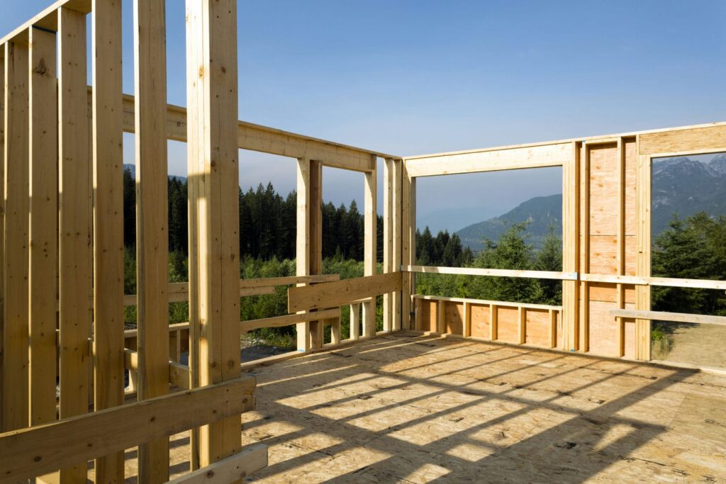 Wood frame with wide stacked window openings showing how design ambition changes the frame