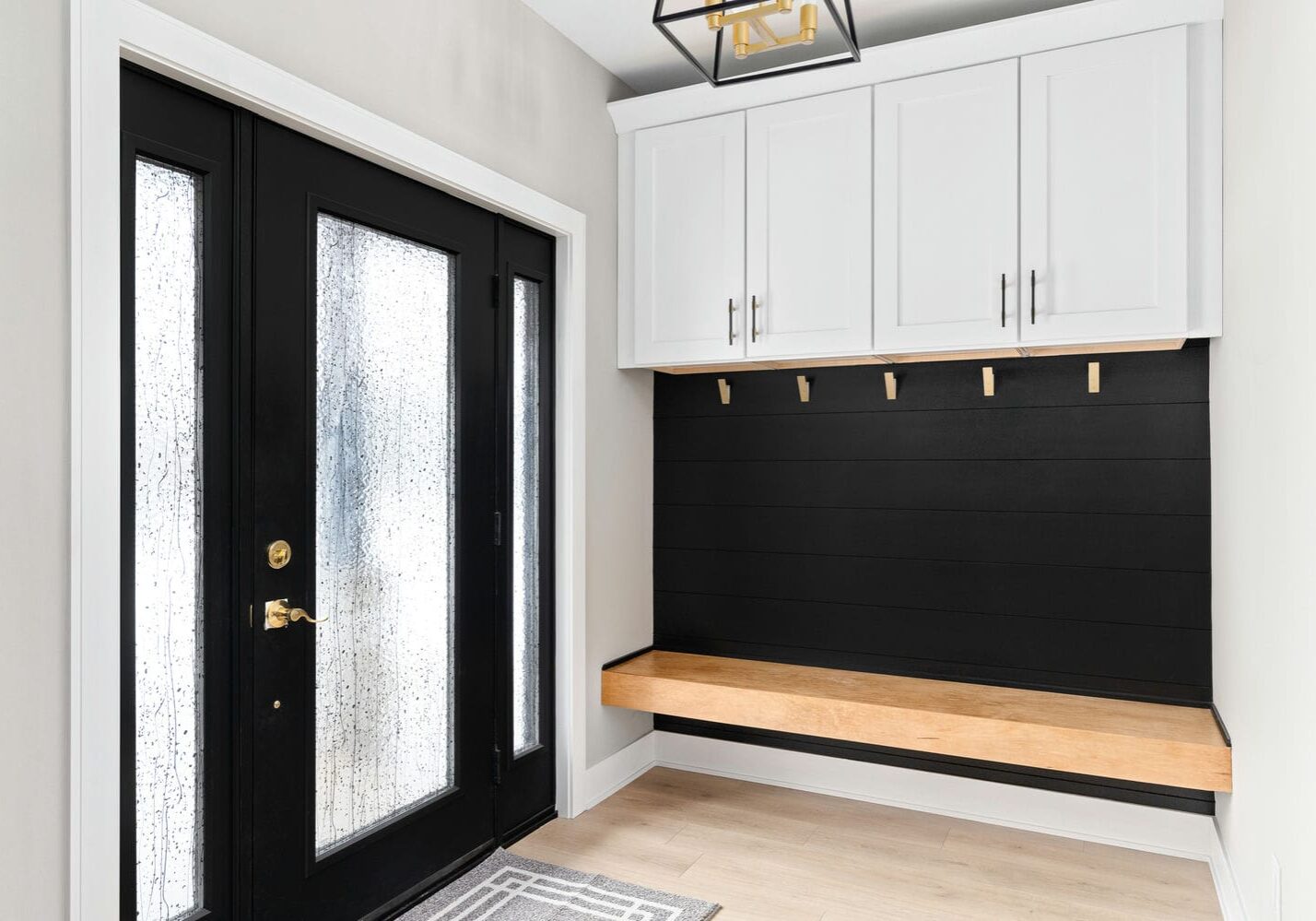 custom mudroom bench and cabinetry installed with interior finishing carpentry