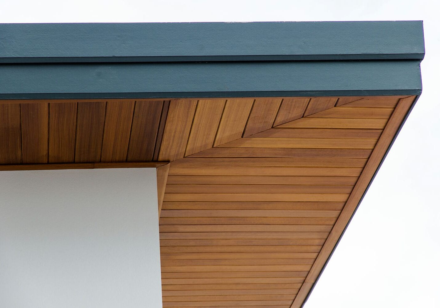 soffit and exterior finishing carpentry detail on modern home roofline